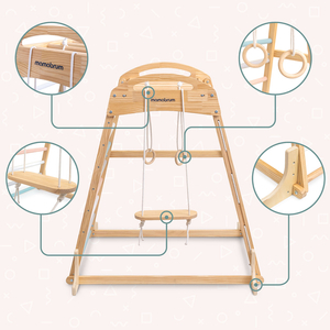 Indendørs legeplads i træ med gynge, gymnastikringe og klatrenet